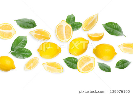 Lemons and lemon slices arranged with green leaves, PNG 139976100