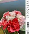 A bouquet of pink and red carnations 139976188