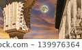 Arches in Islamic (Moorish) style (against the sunset with the super moon) in Alhambra, Granada, Spain 139976364