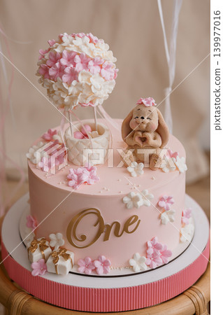 Pink First Birthday Cake with Teddy Bear and Hot Air Balloon Flower Decoration 139977016