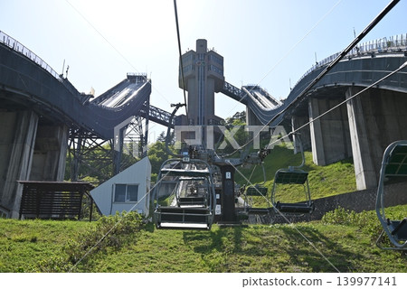 In May, the ski jump at the Hakuba Ski Jumping Stadium, the venue for the Nagano Olympics. In May, the ski jump at the Hakuba Ski Jumping Stadium, the venue for the Nagano Olympics. 139977141