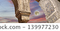 Arches in Islamic (Moorish) style (against the sunset with the super moon) in Alhambra, Granada, Spain 139977230