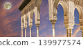 Arches in Islamic (Moorish) style (against the sunset with the super moon) in Alhambra, Granada, Spain 139977574