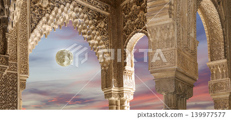 Arches in Islamic (Moorish) style (against the sunset) in Alhambra, Granada, Spain Arches in Islamic (Moorish) style (against the sunset) in Alhambra, Granada, Spain 139977577