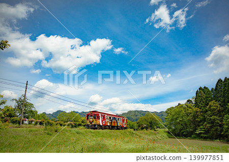 The One Piece train speeds through the blue sky and fresh greenery. The One Piece train speeds through the blue sky and fresh greenery. 139977851