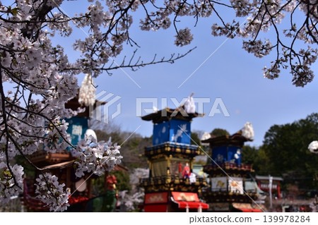 Inuyama City, Aichi Prefecture, Japan: Springtime Inuyama Festival and cherry blossoms in full bloom; floats gathered in front of Inuyama Castle Square; a scene before the dedication of the mechanical puppets. Inuyama City, Aichi Prefecture, Japan: Springtime Inuyama Festival and cherry blossoms in full bloom; floats gathered in front of Inuyama Castle Square; a scene before the dedication of the mechanical puppets. 139978284