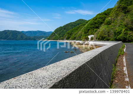 A refreshing seaside scene on a sunny day A refreshing seaside scene on a sunny day 139978401