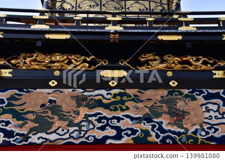 Inuyama City, Aichi Prefecture, Japan: A float called a "Kurumayama" at the Inuyama Festival in spring. It features beautifully colored dragon textiles and golden dragon decorations. Inuyama City, Aichi Prefecture, Japan: A float called a "Kurumayama" at the Inuyama Festival in spring. It features beautifully colored dragon textiles and golden dragon decorations. 139981080