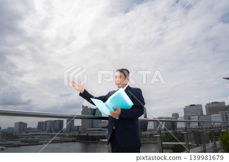 Businessman with drawings Businessman with drawings 139981679