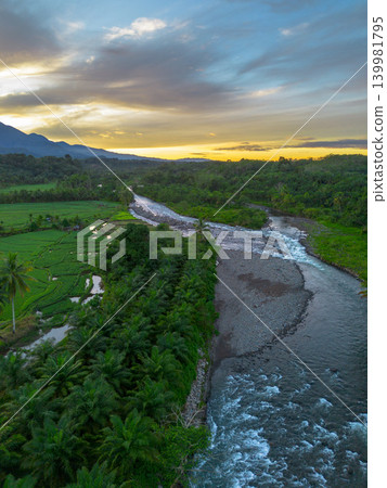 The natural beauty of the Indonesian mountains with beautiful tropical forests at sunrise The natural beauty of the Indonesian mountains with beautiful tropical forests at sunrise 139981795