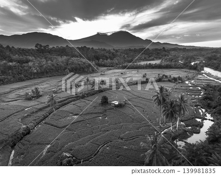 The natural beauty of the Indonesian mountains with beautiful tropical forests at sunrise The natural beauty of the Indonesian mountains with beautiful tropical forests at sunrise 139981835
