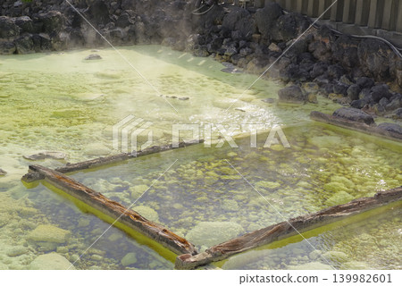 Steam rising from the Yubatake hot spring area of Kusatsu Onsen. Steam rising from the Yubatake hot spring area of Kusatsu Onsen. 139982601
