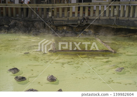 Steam rising from the Yubatake hot spring area of Kusatsu Onsen. Steam rising from the Yubatake hot spring area of Kusatsu Onsen. 139982604