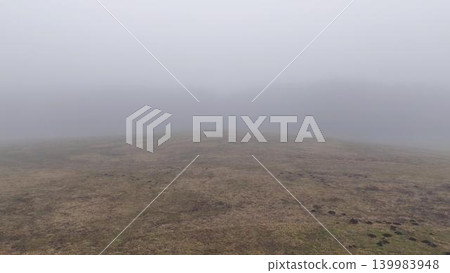 The natural scenery of Asagiri Plateau, shrouded in dense fog that reduces visibility. 139983948