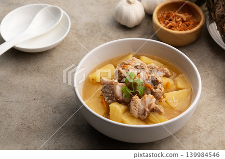Pork Baby Back Ribs or pork cartilage clear soup with pineapple fruit Pork Baby Back Ribs or pork cartilage clear soup with pineapple fruit 139984546