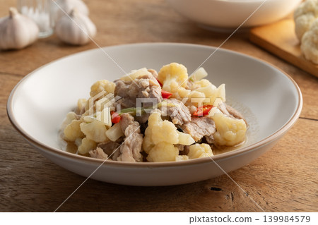 Stir fried Cauliflower with sliced pork meat with oyster sauce Stir fried Cauliflower with sliced pork meat with oyster sauce 139984579