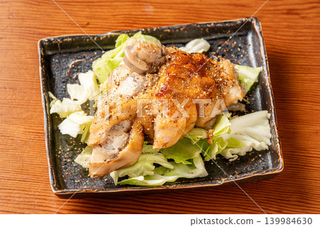 Grilled pig's trotters: A dish of pig's trotters grilled to perfection, rich in collagen. 139984630