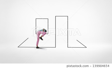 Stressed man bending through abstract line doorway in minimal white space Stressed man bending through abstract line doorway in minimal white space 139984654
