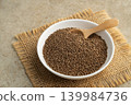 roasted perilla seed in white plate. 139984736