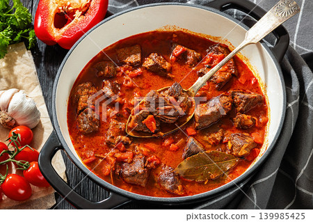 Beef goulash stew with paprika in ceramic pot Beef goulash stew with paprika in ceramic pot 139985425