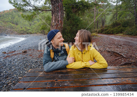 Couple enjoys Turkish coastline near Kemer. Couple enjoys Turkish coastline near Kemer. 139985434