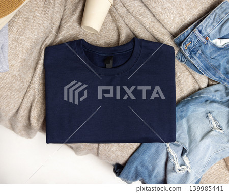 Blank dark blue unisex sweatshirt mockup, folded crewneck casual flat lay with copy space on front 139985441