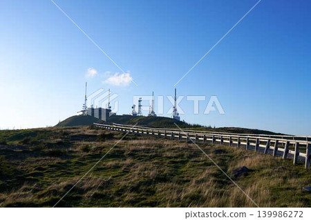 A view of the road and radio tower on Utsukushigahara Plateau A view of the road and radio tower on Utsukushigahara Plateau 139986272