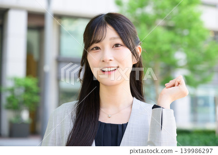 Japanese women doing guts pose Japanese women doing guts pose 139986297