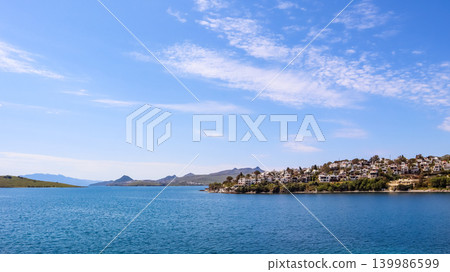 Bitez bay and coastline with traditional white houses under a clear blue sky, Bodrum, Turkey Bitez bay and coastline with traditional white houses under a clear blue sky, Bodrum, Turkey 139986599