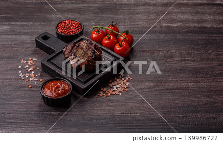 Beef mignon steak, rare, meat grilled with salt and spices. Beef steak Beef mignon steak, rare, meat grilled with salt and spices. Beef steak 139986722