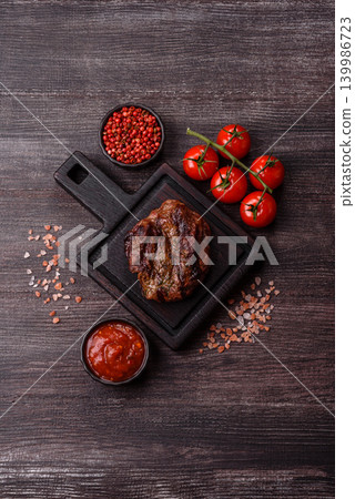 Beef mignon steak, rare, meat grilled with salt and spices. Beef steak Beef mignon steak, rare, meat grilled with salt and spices. Beef steak 139986723