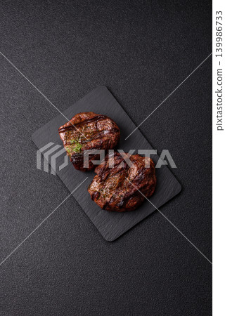Beef mignon steak, rare, meat grilled with salt and spices. Beef steak 139986733