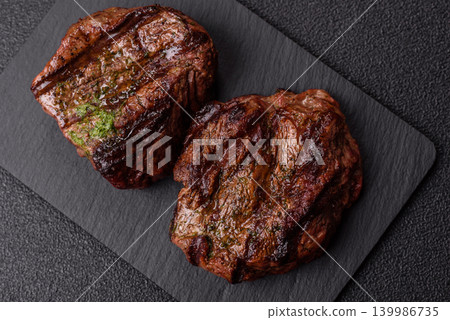 Beef mignon steak, rare, meat grilled with salt and spices. Beef steak 139986735