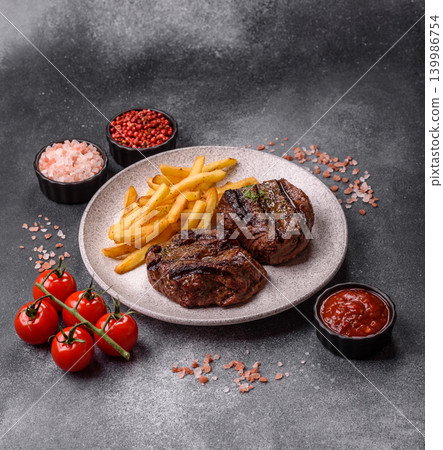 Beef mignon steak, rare, meat grilled with salt and spices. Beef steak Beef mignon steak, rare, meat grilled with salt and spices. Beef steak 139986754