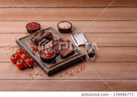 Beef mignon steak, rare, meat grilled with salt and spices. Beef steak Beef mignon steak, rare, meat grilled with salt and spices. Beef steak 139986772