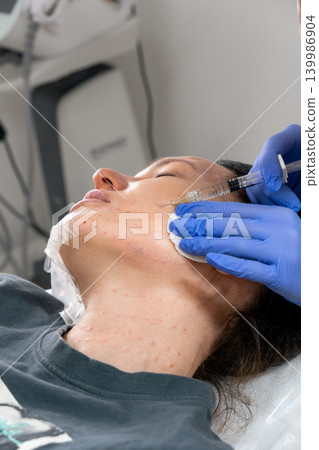 Biorevitalization injections to enhance skin firmness and moisture balance. Biorevitalization injections provide deep moisturizing. Facial biorevitalization to restore hydration and elasticity Biorevitalization injections to enhance skin firmness and moisture balance. Biorevitalization injections provide deep moisturizing. Facial biorevitalization to restore hydration and elasticity 139986904