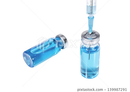 Medical vials with blue vaccine and stuck syringe Medical vials with blue vaccine and stuck syringe 139987291