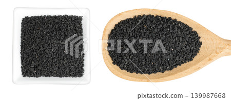Nigella sativa or Black cumin in ceramic bowl and wooden spoon isolated on white background. Top view. Flat lay. Nigella sativa or Black cumin in ceramic bowl and wooden spoon isolated on white background. Top view. Flat lay. 139987668