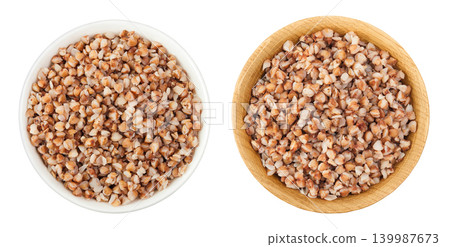 Boiled buckwheat in a ceramic and wooden bowl isolated on white background. Top view. Flat lay Boiled buckwheat in a ceramic and wooden bowl isolated on white background. Top view. Flat lay 139987673