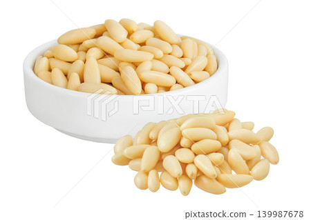Shelled European pine nuts in ceramic bowl isolated on white background with full depth of field Shelled European pine nuts in ceramic bowl isolated on white background with full depth of field 139987678
