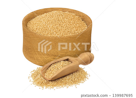 Amaranth grain seeds in wooden bowl and scoop isolated on white background Amaranth grain seeds in wooden bowl and scoop isolated on white background 139987695