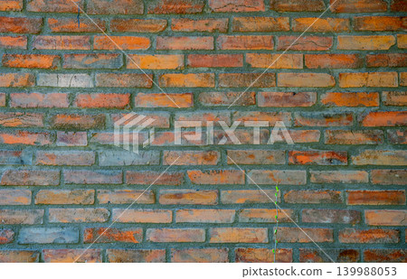 Old cracked brick wall texture with sunlight 139988053