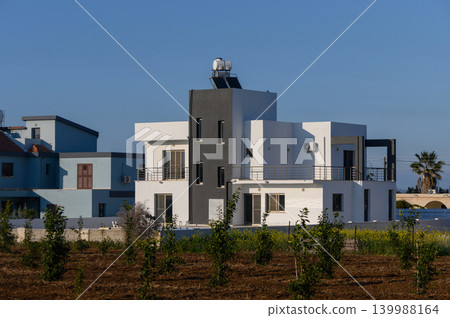 Modern architectural marvel standing proudly against the clear blue sky Cyprus Modern architectural marvel standing proudly against the clear blue sky Cyprus 139988164