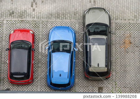 Three Cars Parked Viewed from Above 139988208