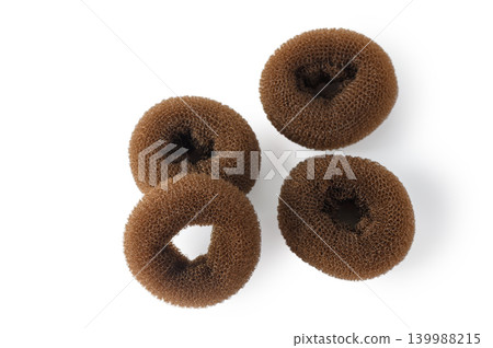 Brown Donut Bun Maker Hair Rollers Set Isolated on White Background Brown Donut Bun Maker Hair Rollers Set Isolated on White Background 139988215