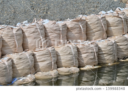 Flood control construction image (flood damage, heavy rain disaster, recovery, flood control construction, river construction, embankment construction) 139988348