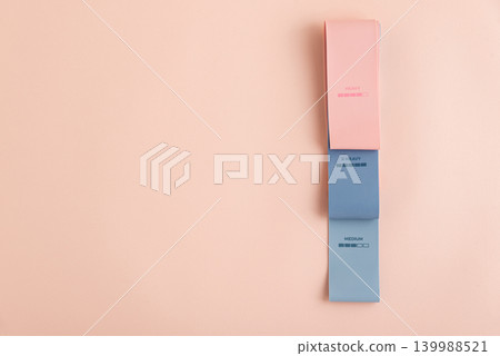 Colorful resistance bands displaying resistance levels for fitness Colorful resistance bands displaying resistance levels for fitness 139988521