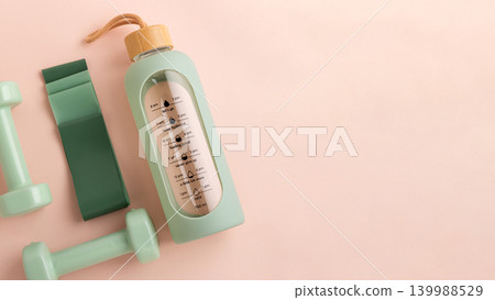 Fitness essentials on pink background for healthy lifestyle Fitness essentials on pink background for healthy lifestyle 139988529