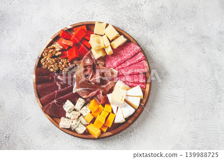 assortment of cheese meat cuts, on a plate, top view, no people, assortment of cheese meat cuts, on a plate, top view, no people, 139988725