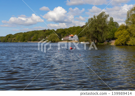 Outdoor canoe training and water sports on Lyngby Lake 139989414